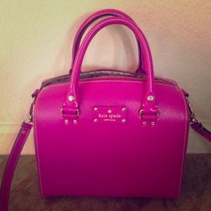 Kate Spade magenta purse with strap option.