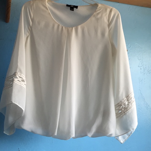 Casual or formal cream colored blouse