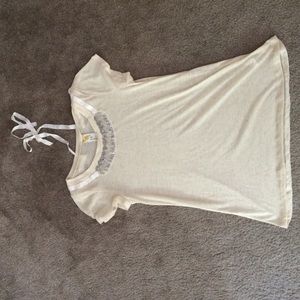 Beige shirt with sequence detailing
