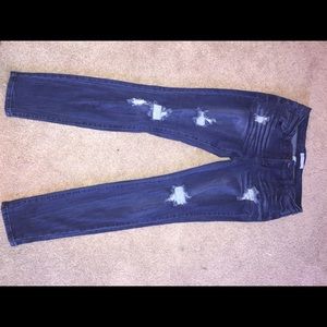 Medium dark wash ripped skinny jeans