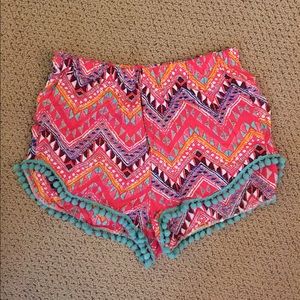 multi colored pattern pom pom shorts