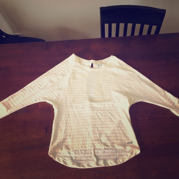 Workout pullover with slit in back