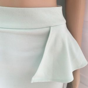 Mint green peplum skirt