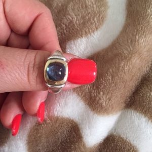 Movado blue topaz, silver and yellow gold ring