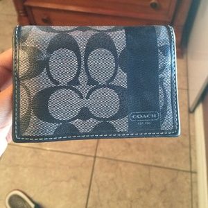 Black coach wallet it has minor wares