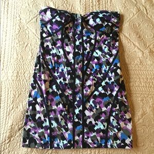 Minuet patterned strapless mini dress.