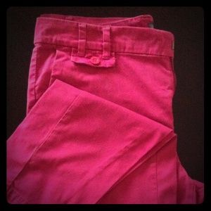 Hot pink Izod trousers.