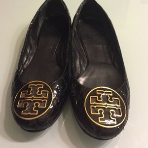 Tory Burch black quilted ballet flat.