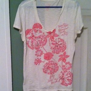 White & pink flowered shirt