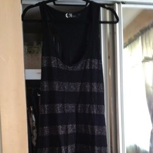 Black and gold sequined racer back dress.