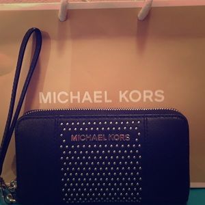 Michael Kors wristlet with Studs.