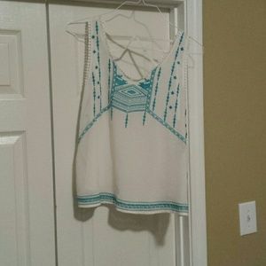 Turquoise and white tank
