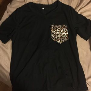 Black shirt with leopard pocket