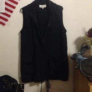 Long black sleeveless jacket