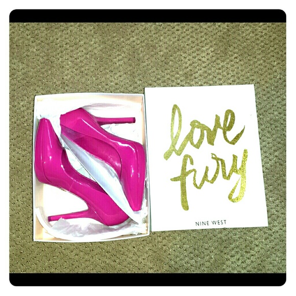 Nine West hot pink, patent leather pumps.