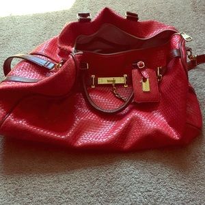Orange Steve Madden weekend bag