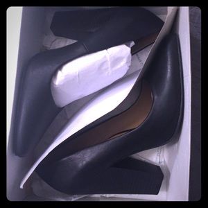 Brand new never been worn black heels