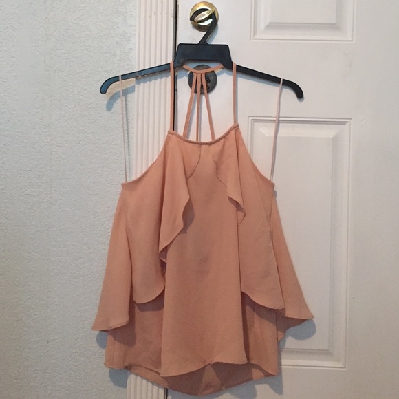 Nude sleeveless blouse