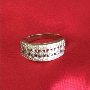 Ladies 10k White Gold ring with many diamonds