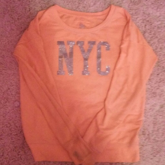 Orange sweatshirt .
