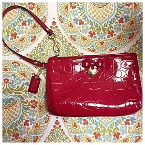 Coach embossed liquid gloss medium wristlet