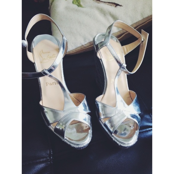 Louboutin Silver heels!!