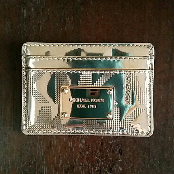 Michael Kors gold card carrier. Shiny gold vgc