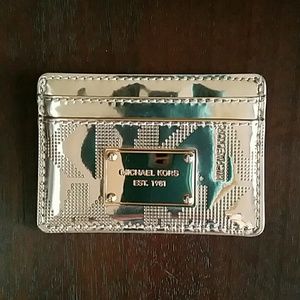 Michael Kors gold card carrier. Shiny gold vgc