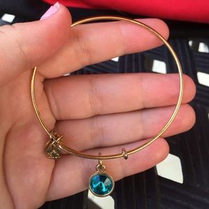 Alex and Ani blue charm,  gold bracelet