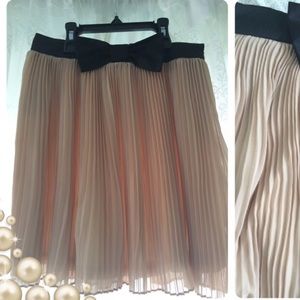 A cute nude pink bow skirt