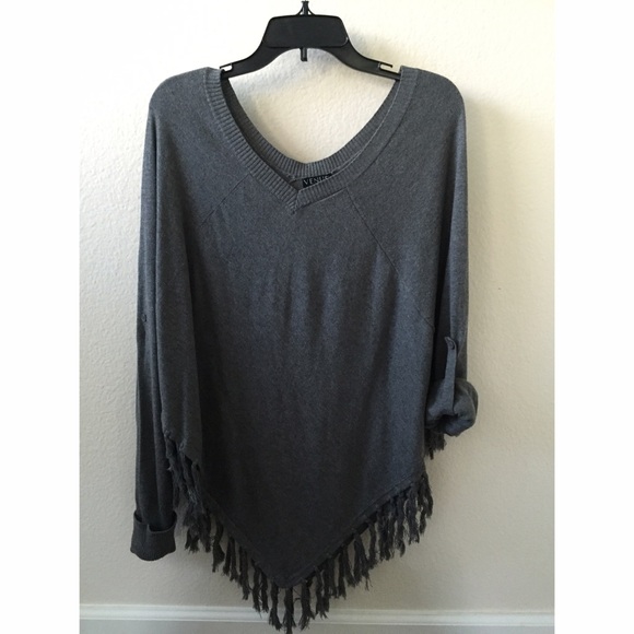 Dark grey long sleeve top with fringe