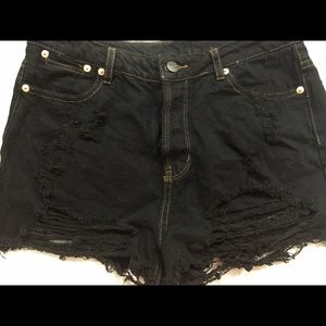 Black cut off frayed denim shorts