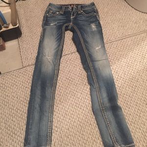 Rock revival Light wash  ripped jeans