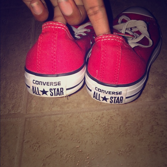 Red Converses  or Chuck Taylor's. Authentic!