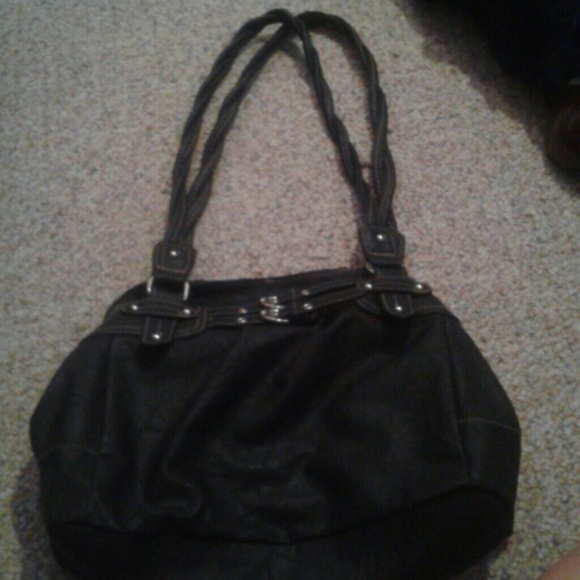 Black bag with braided straps and buckle accent