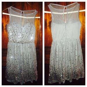 Silver dress with sequins in the bottom
