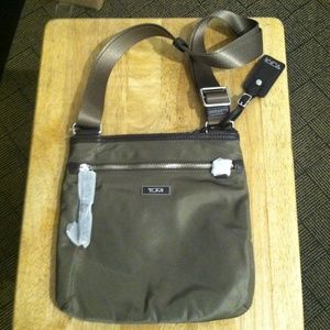 Tumi cross body purse