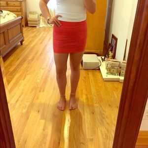 Red-orange mini skirt
