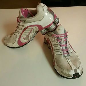 Pink and white nike shox