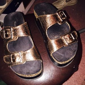 Metallic gold clogs