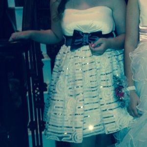 White sparkle dress.. (On the left)