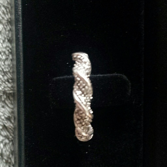 Twisted design diamond pave ring set in SS