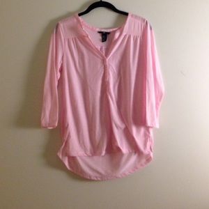 pink flowy pink top with textured shoulders