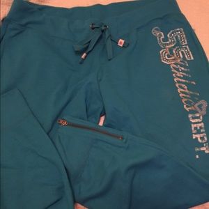 Set of sweat pants and top