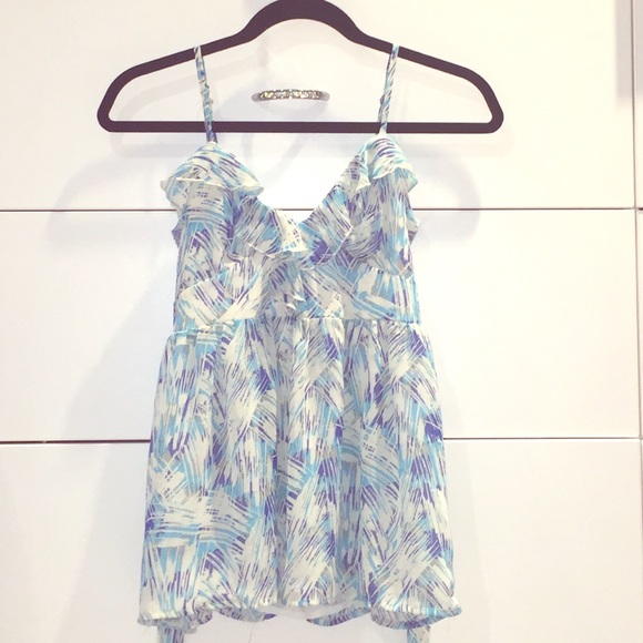 White and light blue strappy blouse