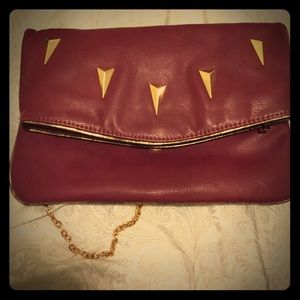 Maroon clutch. Very spacious!
