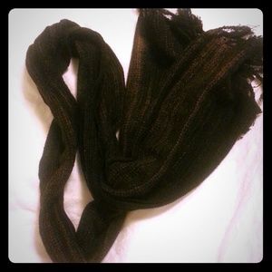 Black scarf with light gold accents