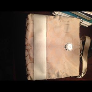 Cream colored coach file Crossbody