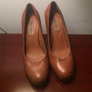 Brown leather pumps