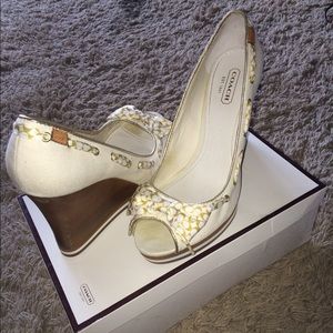 Beautiful white Coach Wedges